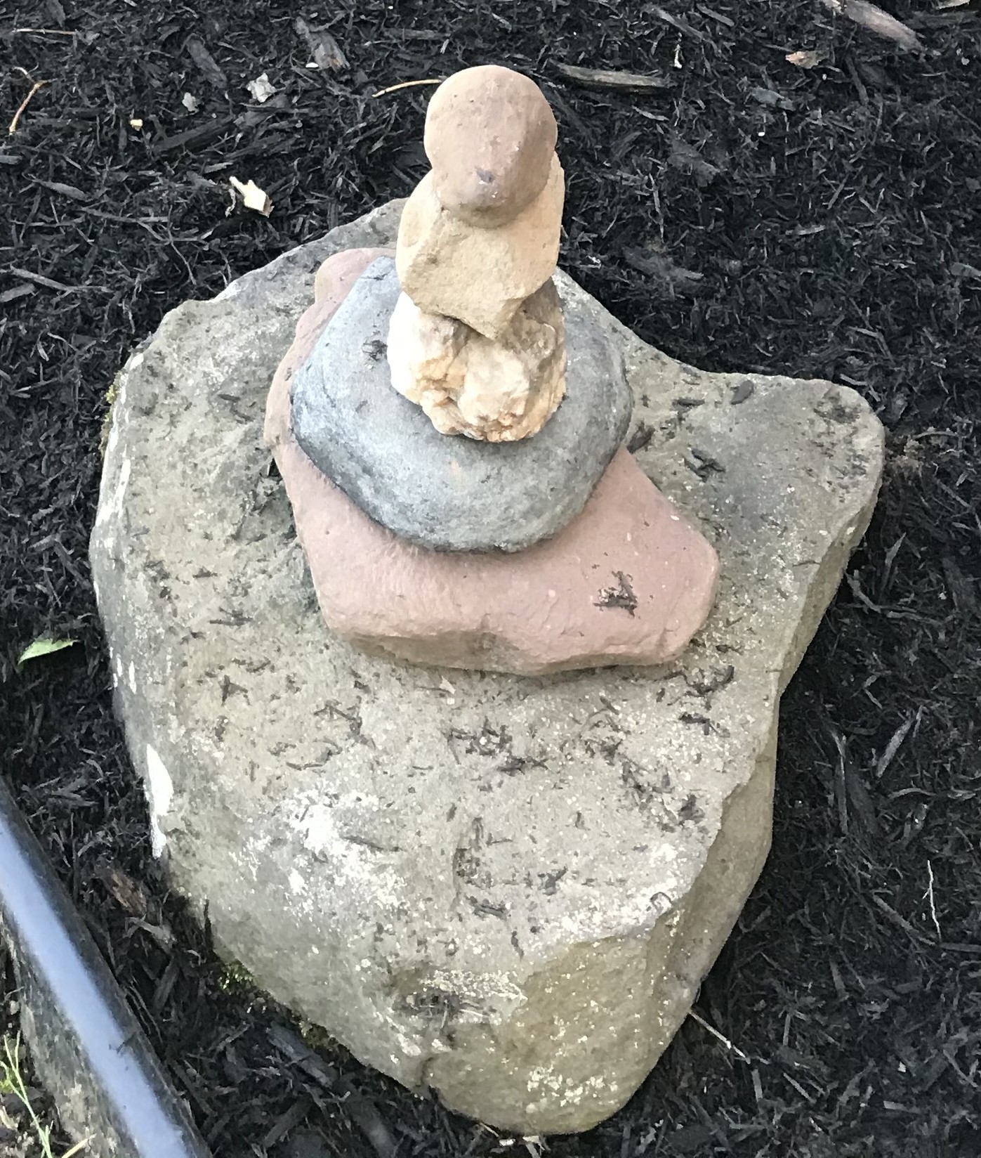 Five-stone stack of mixed colors and textures